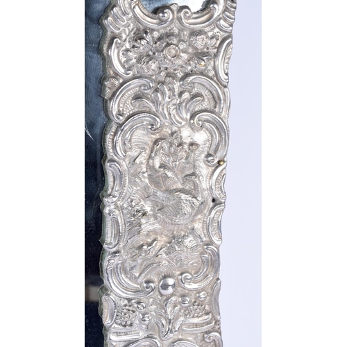 192 - A VERY LARGE 19TH CENTURY CONTINENTAL WHITE METAL OVERLAID COUNTRY HOUSE MIRROR decorated with birds... 