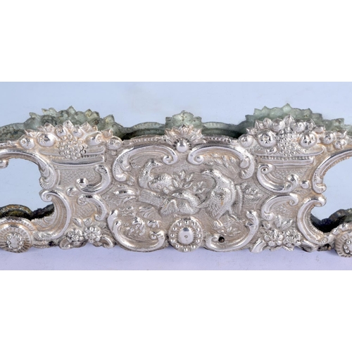 192 - A VERY LARGE 19TH CENTURY CONTINENTAL WHITE METAL OVERLAID COUNTRY HOUSE MIRROR decorated with birds... 