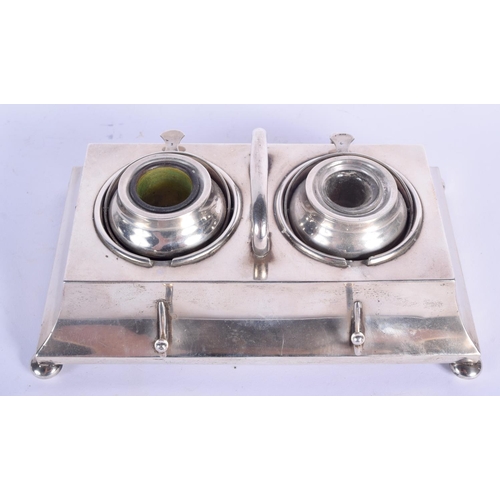 193 - AN EDWARDIAN SILVER RECTANGULAR DESK INK STAND with domed revolving top, supported upon bun feet. 89... 