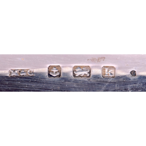 193 - AN EDWARDIAN SILVER RECTANGULAR DESK INK STAND with domed revolving top, supported upon bun feet. 89... 