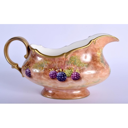 217 - Ex-Royal Worcester artist Frank Higgins sauceboat painted with fruit, signed, late 20th c.19cm Long ... 