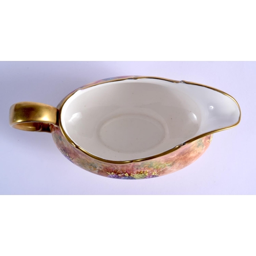 217 - Ex-Royal Worcester artist Frank Higgins sauceboat painted with fruit, signed, late 20th c.19cm Long ... 