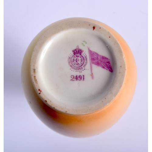 218 - Royal Worcester blush ivory vase painted with roses and a lily, date code 1914. 14.5cm High