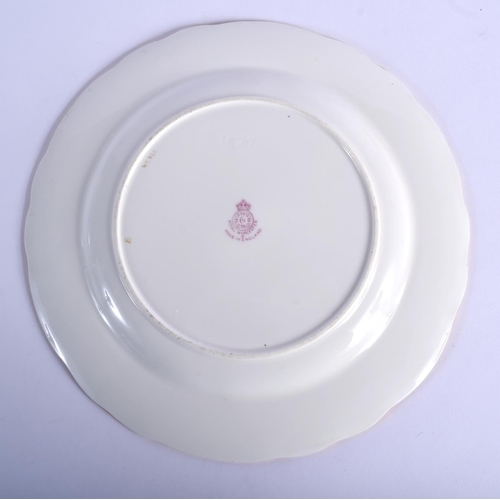 223 - Royal Worcester plate painted with fruit by A. Shuck signed, under a crimson and highly gilt border ... 