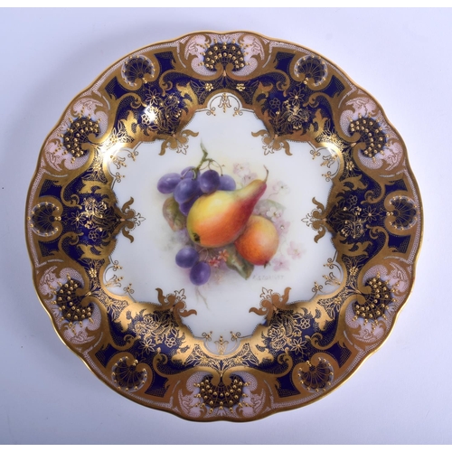 234 - Royal Worcester plate finely painted with fruit under a blue and raided gilt border by R. Sebright, ... 