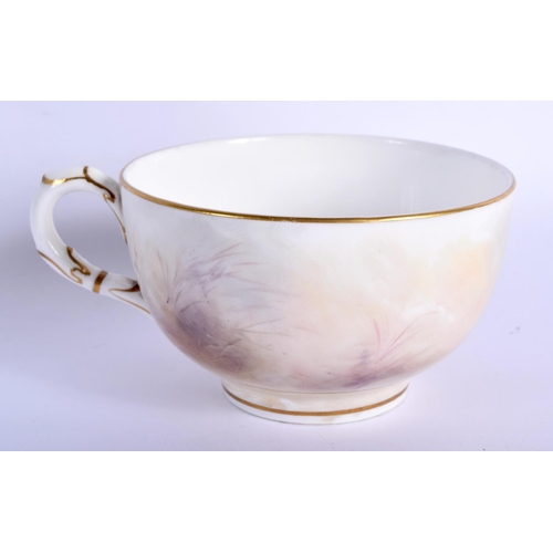 238 - Royal Worcester tea cup and saucer painted with a woodcock and two ducks by Jas Stinton, signed, dat... 