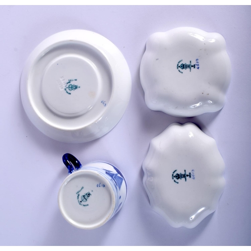 286 - Royal Crown Derby coffee can and saucer and two shaped dishes painted with sailing scenes by W E J D... 