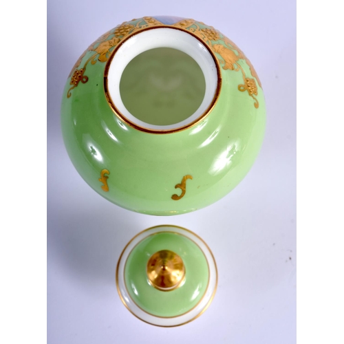 288 - Royal Crown Derby vase and cover painted with a sailing scene on an apple green ground by W E J Dean... 