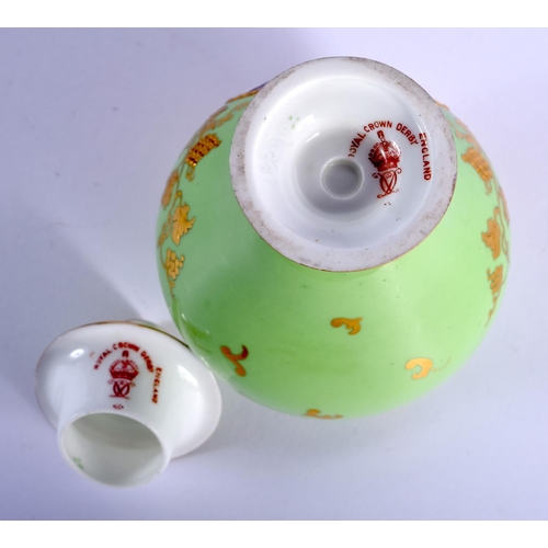288 - Royal Crown Derby vase and cover painted with a sailing scene on an apple green ground by W E J Dean... 