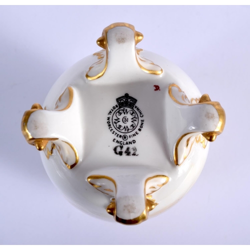 292 - Royal Worcester vase shape G42 with reticulated neck and four ball feet painted with Highland Cattle... 