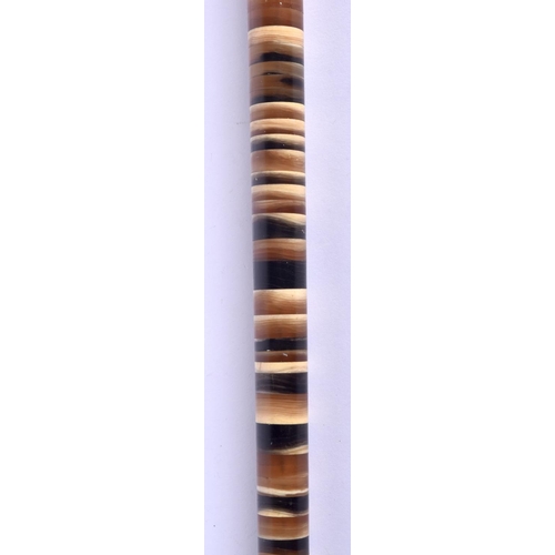 296 - A 19TH CENTURY MIDDLE EASTERN ANGLO INDIAN RHINOCEROS AND BUFFALO HORN WALKING CANE. 90 cm long.