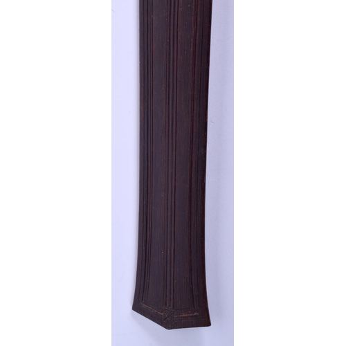 299 - AN AUSTRALIAN TRIBAL PADDLE together with a boomerang. Largest 50 cm long. (2)