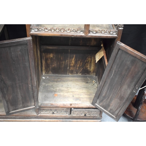 334 - AN EARLY 20TH CENTURY CHINESE CARVED HARDWOOD DISPLAY CABINET Late Qing/Republic. Length 90cm, Width... 