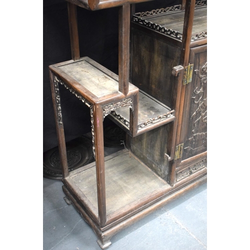 334 - AN EARLY 20TH CENTURY CHINESE CARVED HARDWOOD DISPLAY CABINET Late Qing/Republic. Length 90cm, Width... 