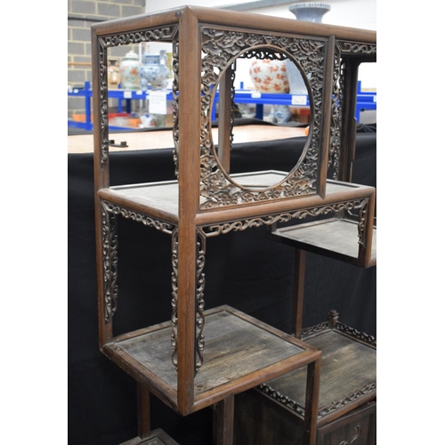 334 - AN EARLY 20TH CENTURY CHINESE CARVED HARDWOOD DISPLAY CABINET Late Qing/Republic. Length 90cm, Width... 