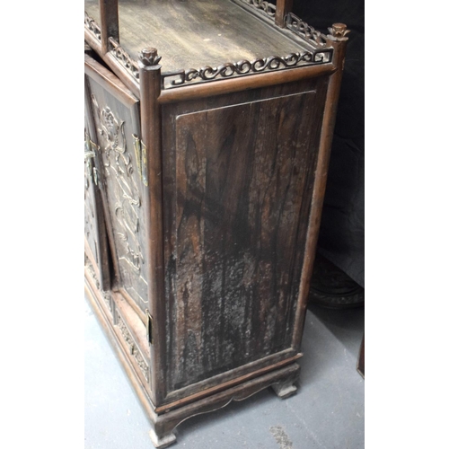 334 - AN EARLY 20TH CENTURY CHINESE CARVED HARDWOOD DISPLAY CABINET Late Qing/Republic. Length 90cm, Width... 