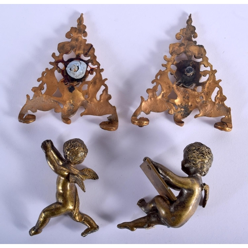 354 - A PAIR OF ANTIQUE BRONZE PUTTI and two gilt metal mounts. (4)