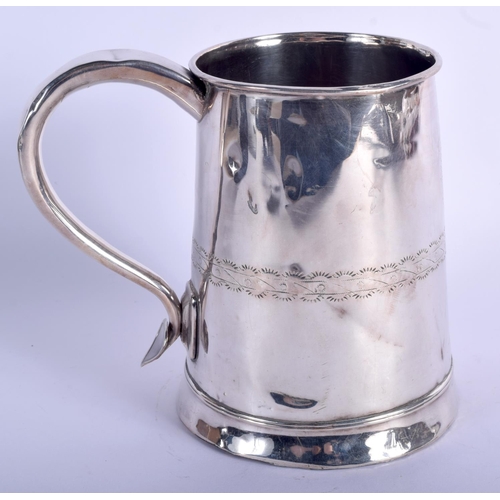 360 - AN EARLY CONTINENTAL WHITE METAL TANKARD. 267 grams. 16 cm x 15 cm.