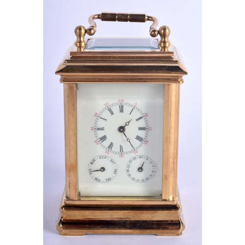 373 - A CONTEMPORARY BRASS CARRIAGE CLOCK. 9.5 cm high inc handle.