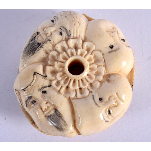 400 - A JAPANESE CARVED BONE NETSUKE. 25 grams. 4 cm x 3.5 cm.