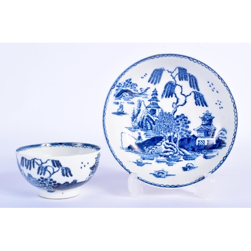 62 - AN 18TH CENTURY ENGLISH BLUE AND WHITE TEABOWL AND SAUCER possibly Derby or Bow, decorated with a Wi... 