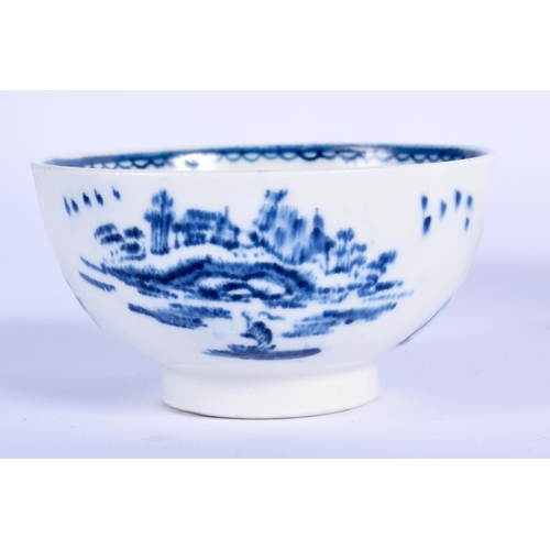 62 - AN 18TH CENTURY ENGLISH BLUE AND WHITE TEABOWL AND SAUCER possibly Derby or Bow, decorated with a Wi... 
