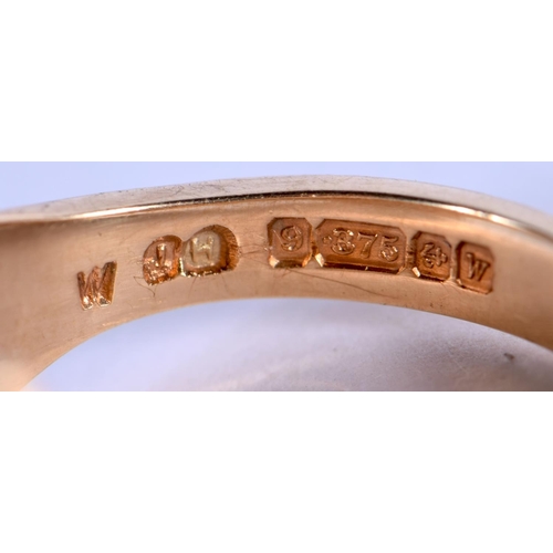 667 - A 9CT GOLD RING. 6.8 grams. T.