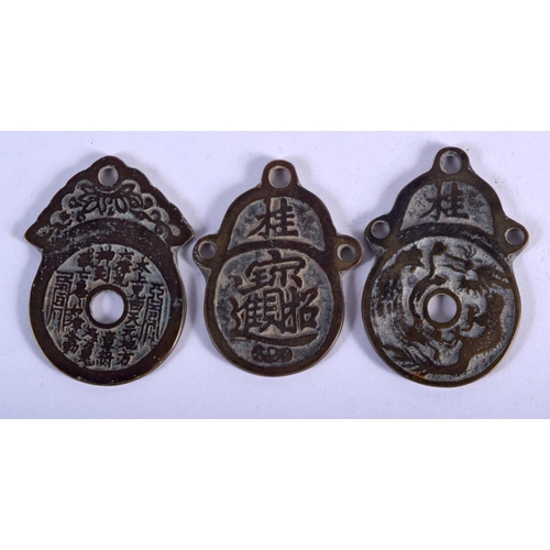 669 - THREE CHINESE BRONZE MEDALLIONS. 99 grams. 6.5 cm x 4 cm. (3)