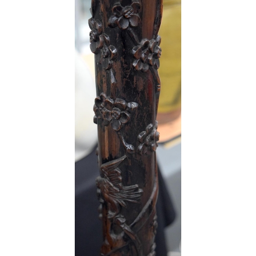 681 - A 19TH CENTURY CHINESE CARVED FLOOR LAMP, decorated with prunus and foliage. 200 cm