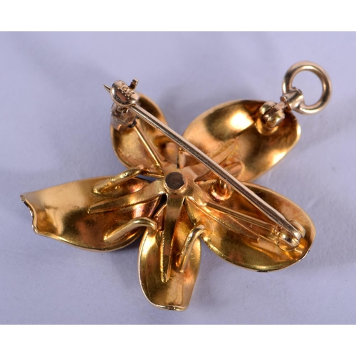 692 - A 14CT GOLD ENAMEL AND DIAMOND FLOWER BROOCH. 5.4 grams. 3.5 cm x 2.5 cm.