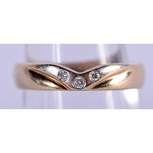 705 - A 9CT GOLD AND DIAMOND RING. 3.3 grams. N/O.