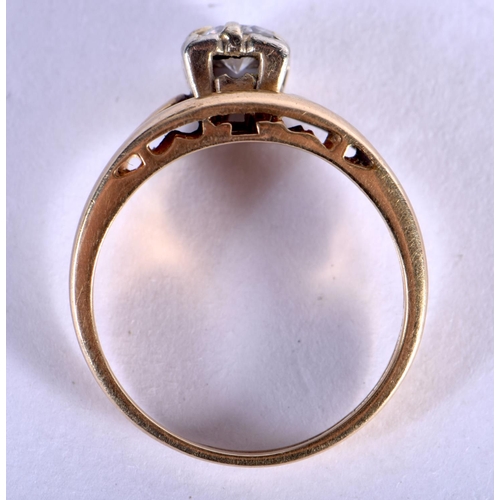 710 - A 14CT GOLD AND DIAMOND RING. 3.6 grams. N.