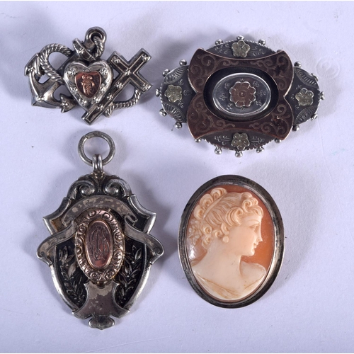 714 - FOUR ANTIQUE BROOCHES. Birmingham 1922 and later. 30 grams. Largest 4.25 cm x 3 cm. (4)