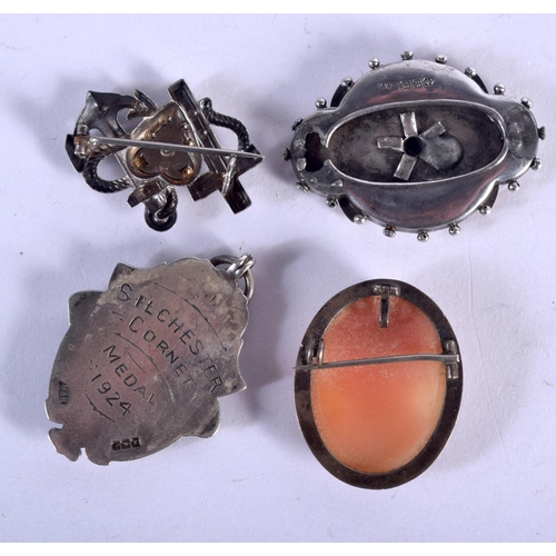 714 - FOUR ANTIQUE BROOCHES. Birmingham 1922 and later. 30 grams. Largest 4.25 cm x 3 cm. (4)