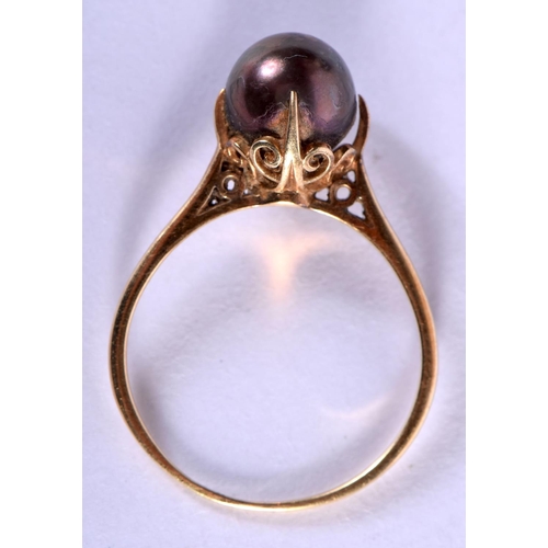 716 - A 14CT GOLD BLACK PEARL RING. 2.3 grams. N.