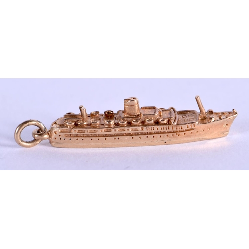 717 - A 9CT GOLD BOAT CHARM. 3.4 grams. 3.25 cm x 0.5 cm.