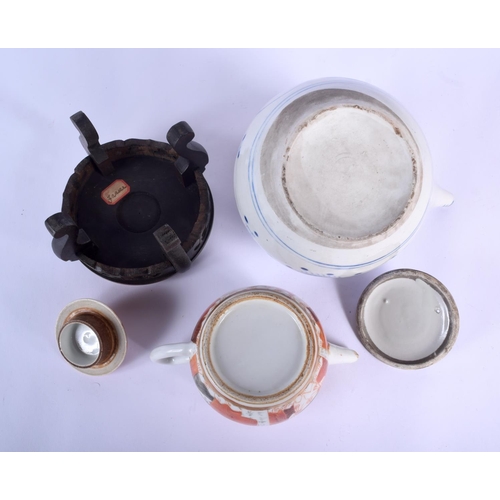 72 - TWO EARLY 20TH CENTURY JAPANESE MEIJI PERIOD TEAPOTS AND COVERS together with a stand. Largest 20 cm... 