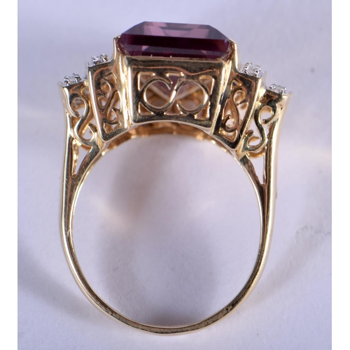 726 - A 14CT GOLD DIAMOND AND AMETHYST RING. 7.8 grams. P.