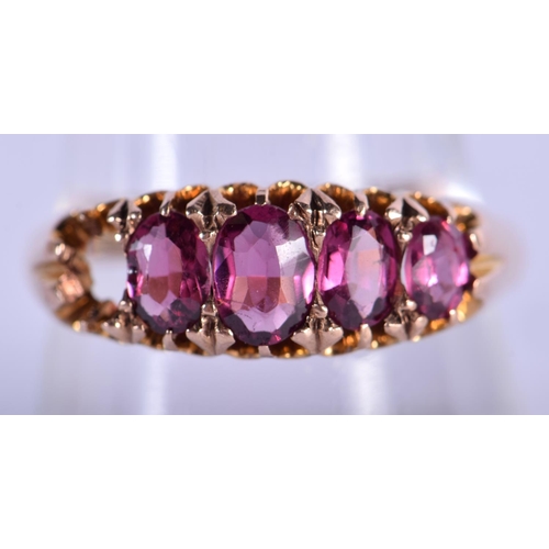 736 - A 9CT GOLD AND RUBY RING. 3.3 grams. S.