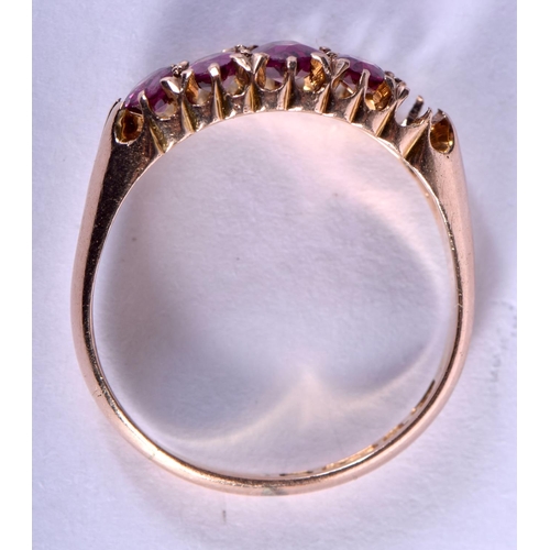 736 - A 9CT GOLD AND RUBY RING. 3.3 grams. S.