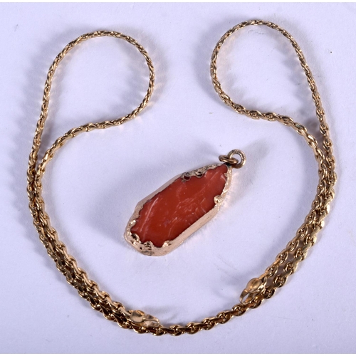 740 - A YELLOW METAL NECKLACE and a pendant. 11.8 grams. 43 cm long. (2)