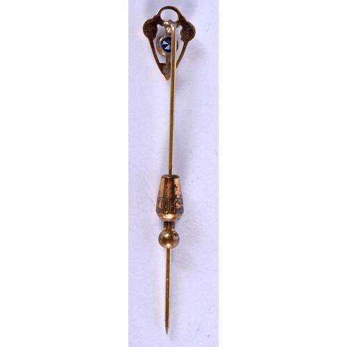 741 - AN ANTIQUE GOLD AND SAPPHIRE TIE PIN. 3.1 grams. 7 cm long.