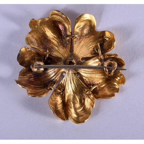 742 - A GOLD DIAMOND AND PEARL FLOWER BROOCH. 3 grams. 2.5 cm wide.