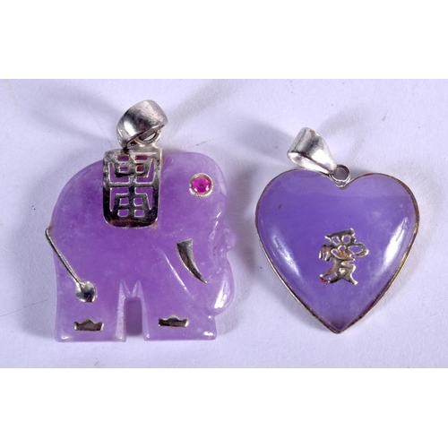 750 - TWO CHINESE SILVER AND LAVENDER JADE PENDANTS. 12 grams. Largest 3.5 cm x 2.5 cm. (2)