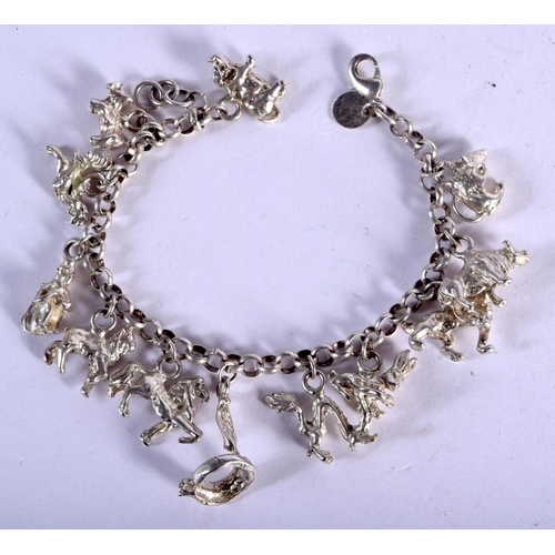 751 - A SILVER CHARM BRACELET. 28 grams. 19 cm long.