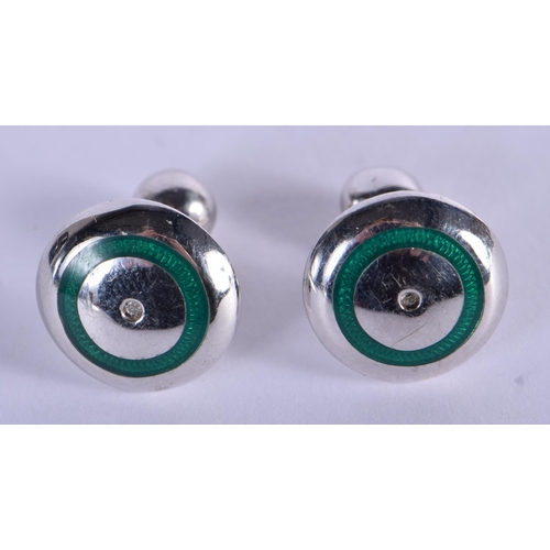 752 - A PAIR OF SILVER AND ENAMEL CUFFLINKS. 13 grams. 1.75 cm x 1.5 cm.