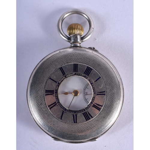 758 - AN ANTIQUE HALF HUNTER SILVER POCKET WATCH. 84 grams. 4.75 cm wide.