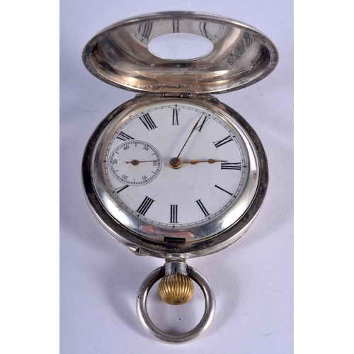 758 - AN ANTIQUE HALF HUNTER SILVER POCKET WATCH. 84 grams. 4.75 cm wide.