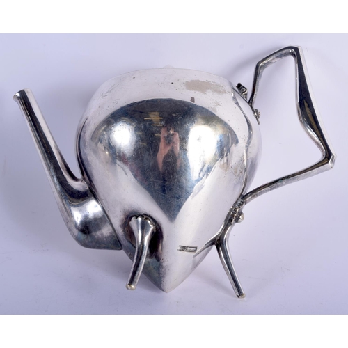 769 - A VERY RARE ART DECO SILVER PLATED THREE PIECE TEASET signed by Christopher Dresser, of rare form wi... 