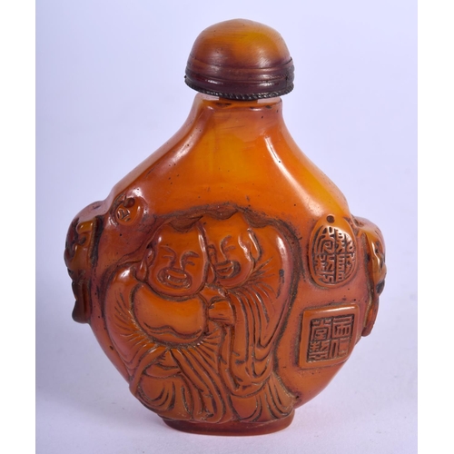 785 - A CHINESE AMBER TYPE SNUFF BOTTLE 20th Century. 52 grams. 7 cm x 5.25 cm.